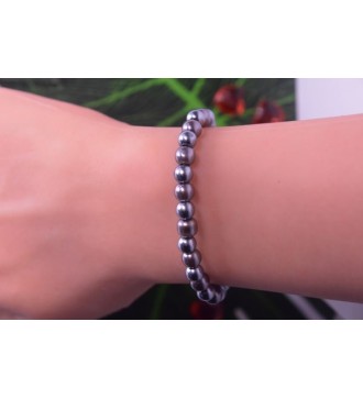 Bracelet en perles grises , argentées et platine élégant