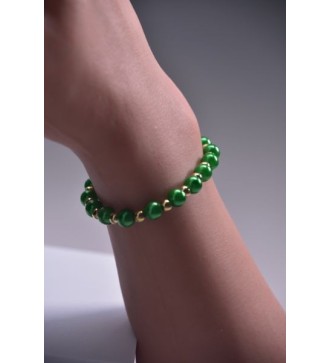 Bracelet en perles émeraude et dorées , chic et élégant