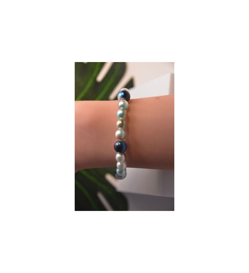 Bracelet en perles bleu marine et blanches élégant