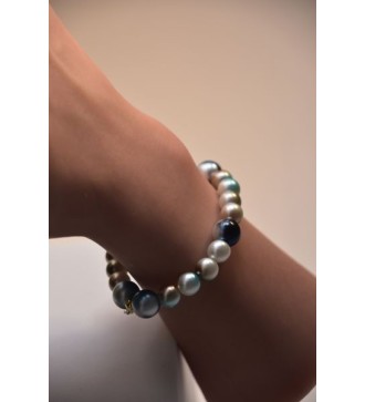 Bracelet en perles bleu marine et blanches élégant