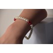 Bracelet Crispation d'amour en perles blanches et rouges Bracelet Crispation d'amour en perles blanches et rouges