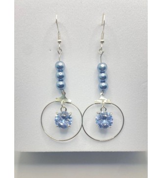 Boucles d'oreilles créoles argentées avec pendentif diamant