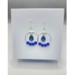 Diamant des Mers – Boucles d’oreilles créoles en acier inoxydable argenté avec perles bleu profond Diamant des Mers – Boucles d’oreilles créoles en acier inoxydable argenté avec perles bleu profond