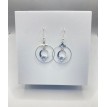Diamant enveloppé – Boucles d’oreilles créoles en acier inoxydable argenté avec pendentif Diamant enveloppé – Boucles d’oreilles créoles en acier inoxydable argenté avec pendentif