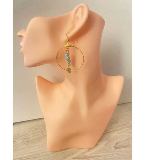 Boucles d'oreilles créole avec plume et perles bleu