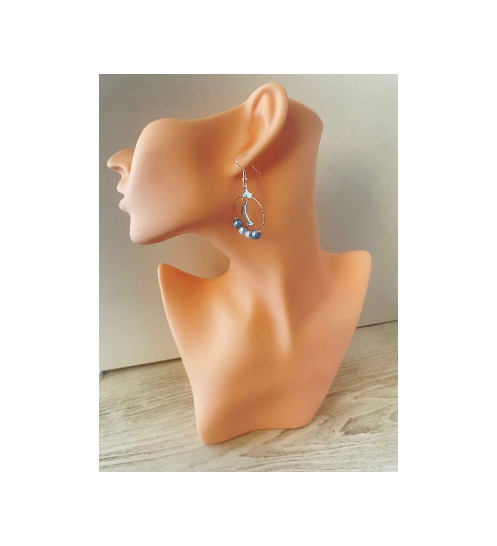 Boucles d'oreilles créoles argentées avec perles bleues