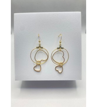 Boucles d'oreilles créoles dorées avec coeur pendu