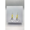 Éclat de Jour – Boucles pendantes perles jaunes et pendentif étoile en acier inoxydable argent Éclat de Jour – Boucles pendantes perles jaunes et pendentif étoile en acier inoxydable argent