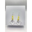 Éclat de Jour – Boucles pendantes perles jaunes et pendentif étoile en acier inoxydable argent Éclat de Jour – Boucles pendantes perles jaunes et pendentif étoile en acier inoxydable argent