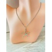 Etoile Lumineuse – Collier argenté en acier inoxydable avec pendentif étoile et pierre brillante Etoile Lumineuse – Collier argenté en acier inoxydable avec pendentif étoile et pierre brillante