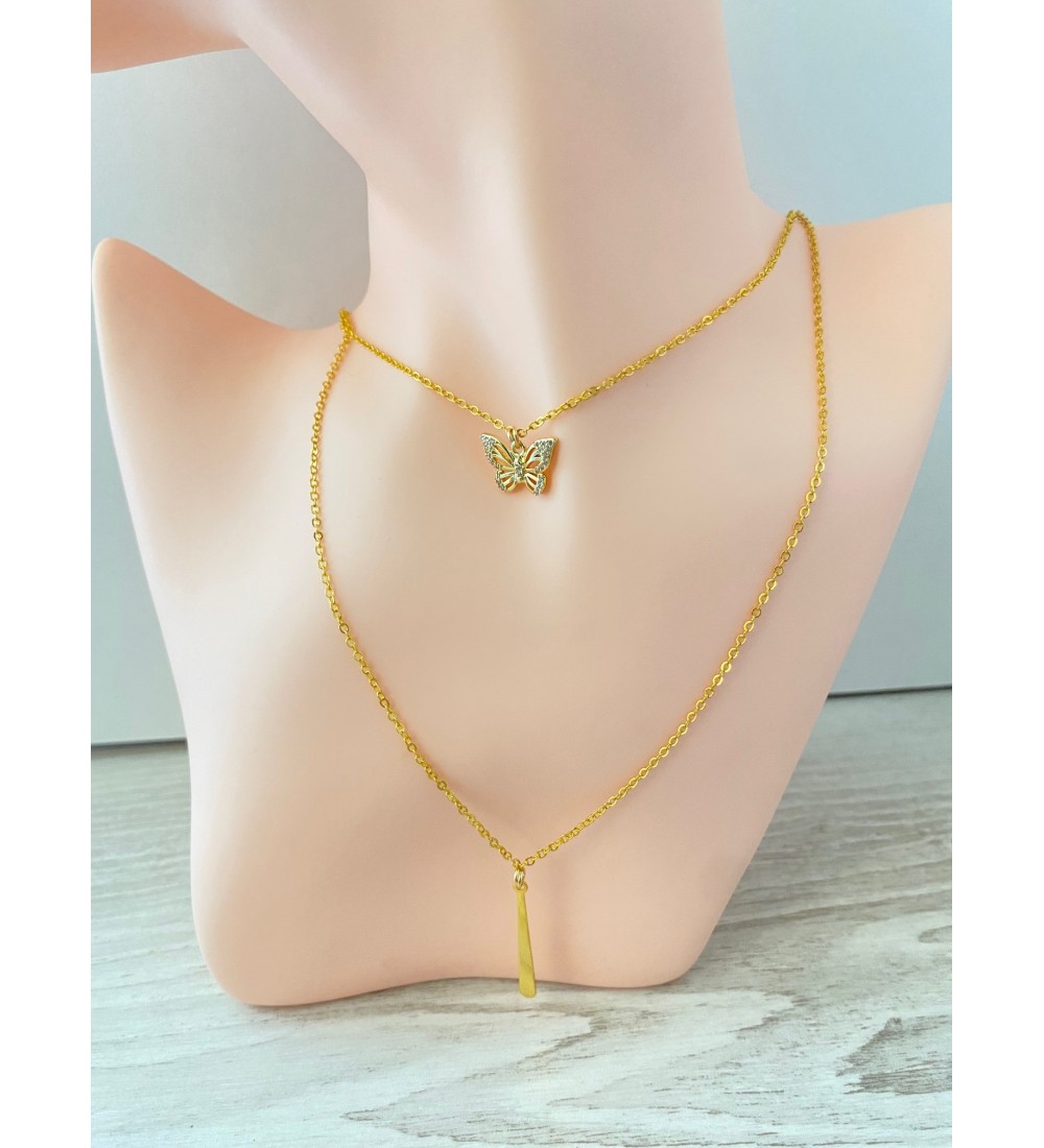 Collier double chaîne or avec pendentif papillon strass