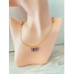 Papillonnage – Collier doré avec perles bicolores et pendentif papillon en strass raffiné Papillonnage – Collier doré avec perles bicolores et pendentif papillon en strass raffiné