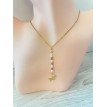 Papillon de Lumière – Collier doré avec perles blanches et marron et pendentif papillon doré raffiné Papillon de Lumière – Collier doré avec perles blanches et marron et pendentif papillon doré raffiné