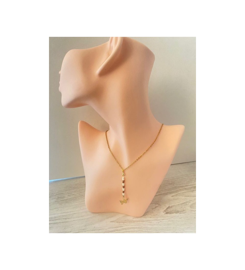 Collier or avec perles et papillon doré