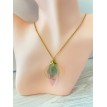 l'anneau des Rêves – Collier doré avec pendentif aile de papillon dans un anneau raffiné l'anneau des Rêves – Collier doré avec pendentif aile de papillon dans un anneau raffiné
